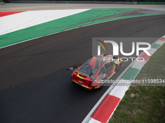 Darren Leung, Toby Sowery, and Jake Dennis of Team Century Motorsport drive a BMW M4 GT3 during a race of the Fanatec GT World Challenge in...