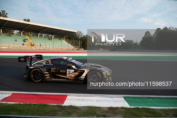 David Pittard, Valentin Hasse-Clot, and Henrique Chaves of the Walkenhorst Motorsport team drive an Aston Martin Vantage AMR GT3 EVO during...