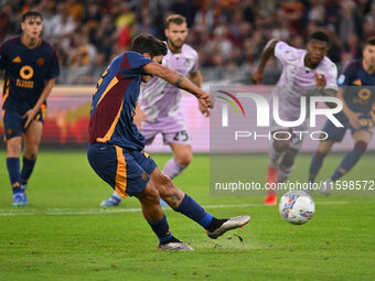 Paulo Dybala of A.S. Roma scores the 2-0 goal during the 5th day of the Serie A Championship between A.S. Roma and Udinese Calcio at the Oly...