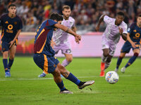 Paulo Dybala of A.S. Roma scores the 2-0 goal during the 5th day of the Serie A Championship between A.S. Roma and Udinese Calcio at the Oly...