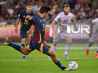 Paulo Dybala of A.S. Roma scores the 2-0 goal during the 5th day of the Serie A Championship between A.S. Roma and Udinese Calcio at the Oly...