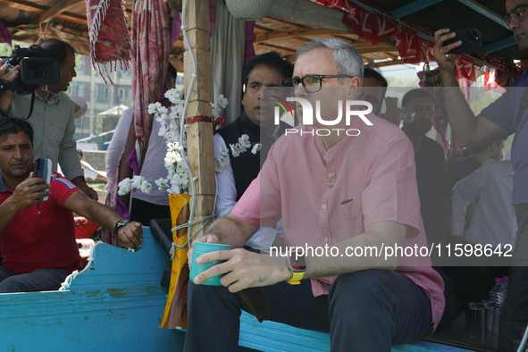 Omar Abdullah, leader of the National Conference, a regional political party, poses for a picture during a boat rally ahead of the second ph...