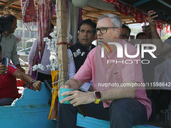 Omar Abdullah, leader of the National Conference, a regional political party, poses for a picture during a boat rally ahead of the second ph...