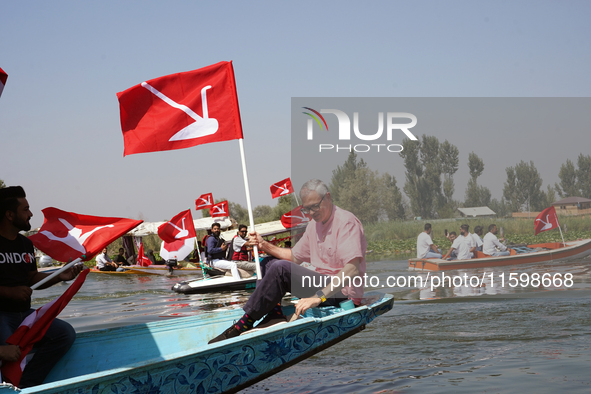 Omar Abdullah, leader of the National Conference, a regional political party, poses for a picture during a boat rally ahead of the second ph...