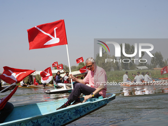 Omar Abdullah, leader of the National Conference, a regional political party, poses for a picture during a boat rally ahead of the second ph...