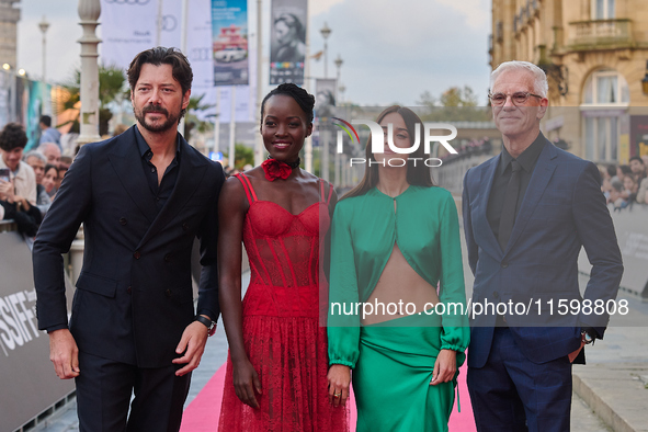 Lupita Nyong'o, Alvaro Norte, Macarena Garcia, and Chris Sanders attend the red carpet of the film The Wild Robot during the 72nd San Sebast...