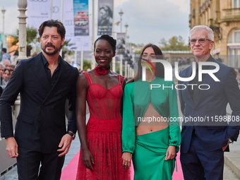 Lupita Nyong'o, Alvaro Norte, Macarena Garcia, and Chris Sanders attend the red carpet of the film The Wild Robot during the 72nd San Sebast...