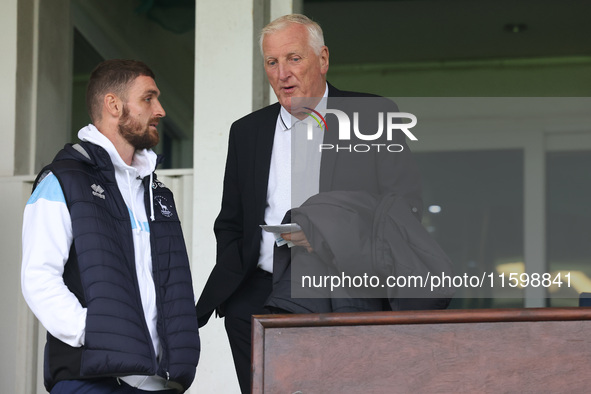 Former Hartlepool United manager Ronnie Moore talks to Hartlepool United's Luke Waterfall during the Vanarama National League match between...