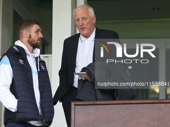 Former Hartlepool United manager Ronnie Moore talks to Hartlepool United's Luke Waterfall during the Vanarama National League match between...