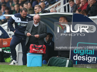 Hartlepool manager Darren Sarll and Lennie Lawrence converse in the dugout during the Vanarama National League match between Hartlepool Unit...