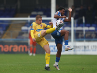 Sam Ling of Dagenham & Redbridge is in action with Hartlepool United's Roshaun Mathurin during the Vanarama National League match between Ha...