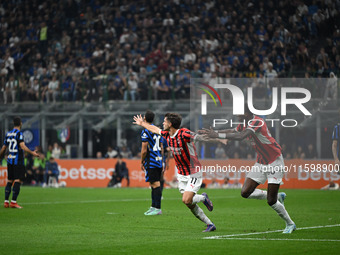 Christian Pulisic of AC Milan celebrates after a goal during the Italian Serie A football match between Inter FC and AC Milan in Milan, Ital...