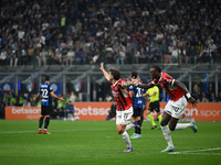 Christian Pulisic of AC Milan celebrates after a goal during the Italian Serie A football match between Inter FC and AC Milan in Milan, Ital...