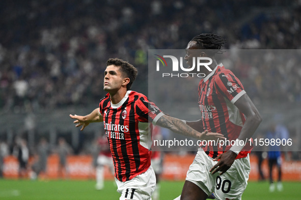 Christian Pulisic of AC Milan celebrates after a goal during the Italian Serie A football match between Inter FC and AC Milan in Milan, Ital...