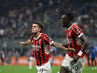 Christian Pulisic of AC Milan celebrates after a goal during the Italian Serie A football match between Inter FC and AC Milan in Milan, Ital...