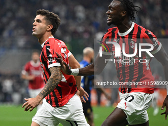 Christian Pulisic of AC Milan celebrates after a goal during the Italian Serie A football match between Inter FC and AC Milan in Milan, Ital...