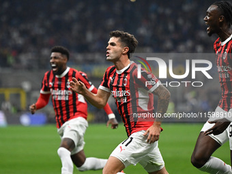 Christian Pulisic of AC Milan celebrates after a goal during the Italian Serie A football match between Inter FC and AC Milan in Milan, Ital...