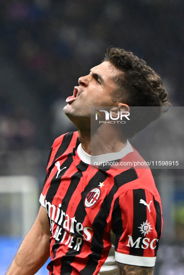 Christian Pulisic of AC Milan celebrates after a goal during the Italian Serie A football match between Inter FC and AC Milan in Milan, Ital...