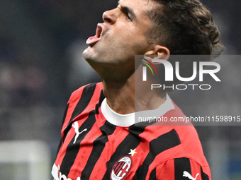 Christian Pulisic of AC Milan celebrates after a goal during the Italian Serie A football match between Inter FC and AC Milan in Milan, Ital...