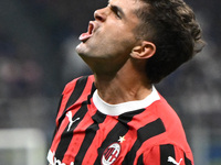 Christian Pulisic of AC Milan celebrates after a goal during the Italian Serie A football match between Inter FC and AC Milan in Milan, Ital...