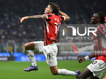 Christian Pulisic of AC Milan celebrates after a goal during the Italian Serie A football match between Inter FC and AC Milan in Milan, Ital...