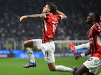 Christian Pulisic of AC Milan celebrates after a goal during the Italian Serie A football match between Inter FC and AC Milan in Milan, Ital...