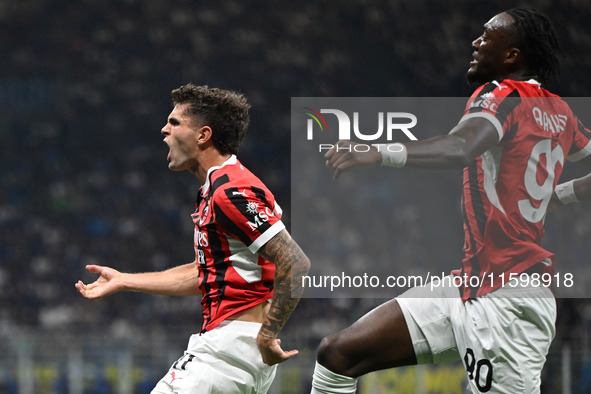 Christian Pulisic of AC Milan celebrates after a goal during the Italian Serie A football match between Inter FC and AC Milan in Milan, Ital...