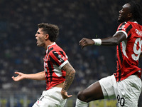 Christian Pulisic of AC Milan celebrates after a goal during the Italian Serie A football match between Inter FC and AC Milan in Milan, Ital...