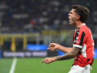 Christian Pulisic of AC Milan celebrates after a goal during the Italian Serie A football match between Inter FC and AC Milan in Milan, Ital...