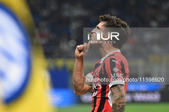 Christian Pulisic of AC Milan celebrates after a goal during the Italian Serie A football match between Inter FC and AC Milan in Milan, Ital...