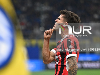 Christian Pulisic of AC Milan celebrates after a goal during the Italian Serie A football match between Inter FC and AC Milan in Milan, Ital...