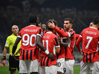 Christian Pulisic of AC Milan celebrates after a goal during the Italian Serie A football match between Inter FC and AC Milan in Milan, Ital...