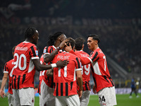 Christian Pulisic of AC Milan celebrates after a goal during the Italian Serie A football match between Inter FC and AC Milan in Milan, Ital...