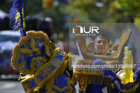 A general view of the 48th Queens Hispanic Parade 2024 marches down 37th Avenue, from 69th Street to 86th Street, through Jackson Heights, Q...