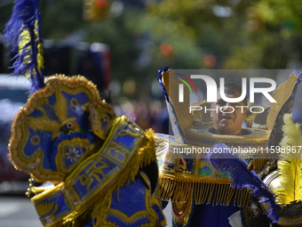 A general view of the 48th Queens Hispanic Parade 2024 marches down 37th Avenue, from 69th Street to 86th Street, through Jackson Heights, Q...