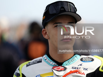 Angel Piqueras and Leopard Racing from Spain look on before the Moto3 race of the MotoGP of Emilia Romagna at Misano World Circuit in Misano...