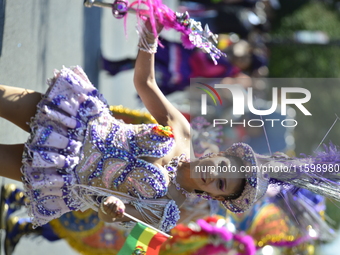 A general view of the 48th Queens Hispanic Parade 2024 marches down 37th Avenue, from 69th Street to 86th Street, through Jackson Heights, Q...