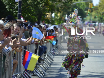 A general view of the 48th Queens Hispanic Parade 2024 marches down 37th Avenue, from 69th Street to 86th Street, through Jackson Heights, Q...