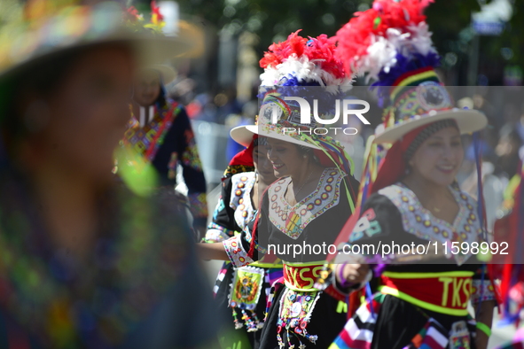 A general view of the 48th Queens Hispanic Parade 2024 marches down 37th Avenue, from 69th Street to 86th Street, through Jackson Heights, Q...