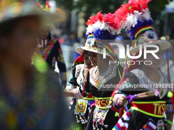 A general view of the 48th Queens Hispanic Parade 2024 marches down 37th Avenue, from 69th Street to 86th Street, through Jackson Heights, Q...