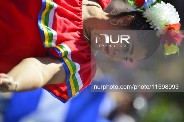 A general view of the 48th Queens Hispanic Parade 2024 marches down 37th Avenue, from 69th Street to 86th Street, through Jackson Heights, Q...