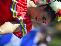 A general view of the 48th Queens Hispanic Parade 2024 marches down 37th Avenue, from 69th Street to 86th Street, through Jackson Heights, Q...