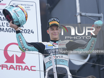 Angel Piqueras and Spain and Leopard Racing celebrate the second place scored during the Moto3 race of the MotoGP of Emilia Romagna at Misan...