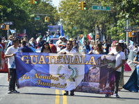 A general view of the 48th Queens Hispanic Parade 2024 marches down 37th Avenue, from 69th Street to 86th Street, through Jackson Heights, Q...