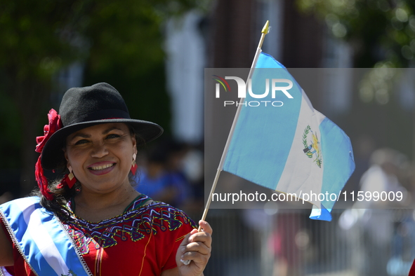 A general view of the 48th Queens Hispanic Parade 2024 marches down 37th Avenue, from 69th Street to 86th Street, through Jackson Heights, Q...