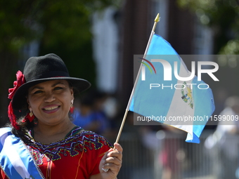 A general view of the 48th Queens Hispanic Parade 2024 marches down 37th Avenue, from 69th Street to 86th Street, through Jackson Heights, Q...