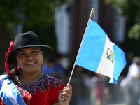 A general view of the 48th Queens Hispanic Parade 2024 marches down 37th Avenue, from 69th Street to 86th Street, through Jackson Heights, Q...