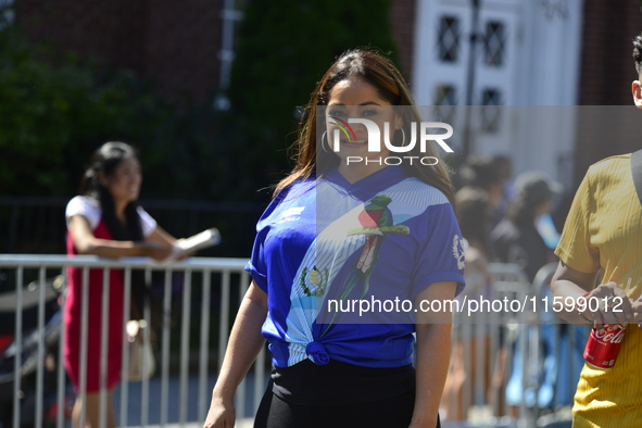 A general view of the 48th Queens Hispanic Parade 2024 marches down 37th Avenue, from 69th Street to 86th Street, through Jackson Heights, Q...