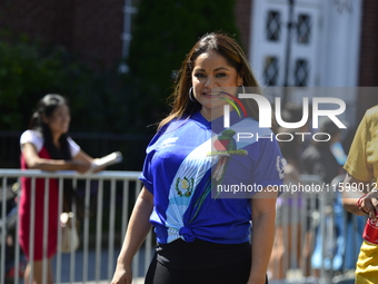 A general view of the 48th Queens Hispanic Parade 2024 marches down 37th Avenue, from 69th Street to 86th Street, through Jackson Heights, Q...