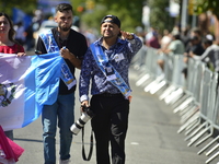 A general view of the 48th Queens Hispanic Parade 2024 marches down 37th Avenue, from 69th Street to 86th Street, through Jackson Heights, Q...